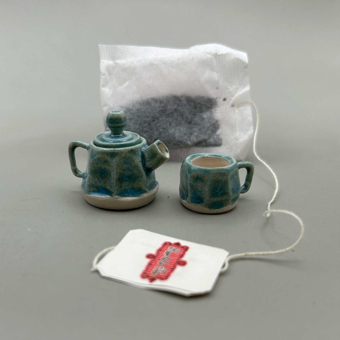Miniature Teapot and Cup Green Faceted